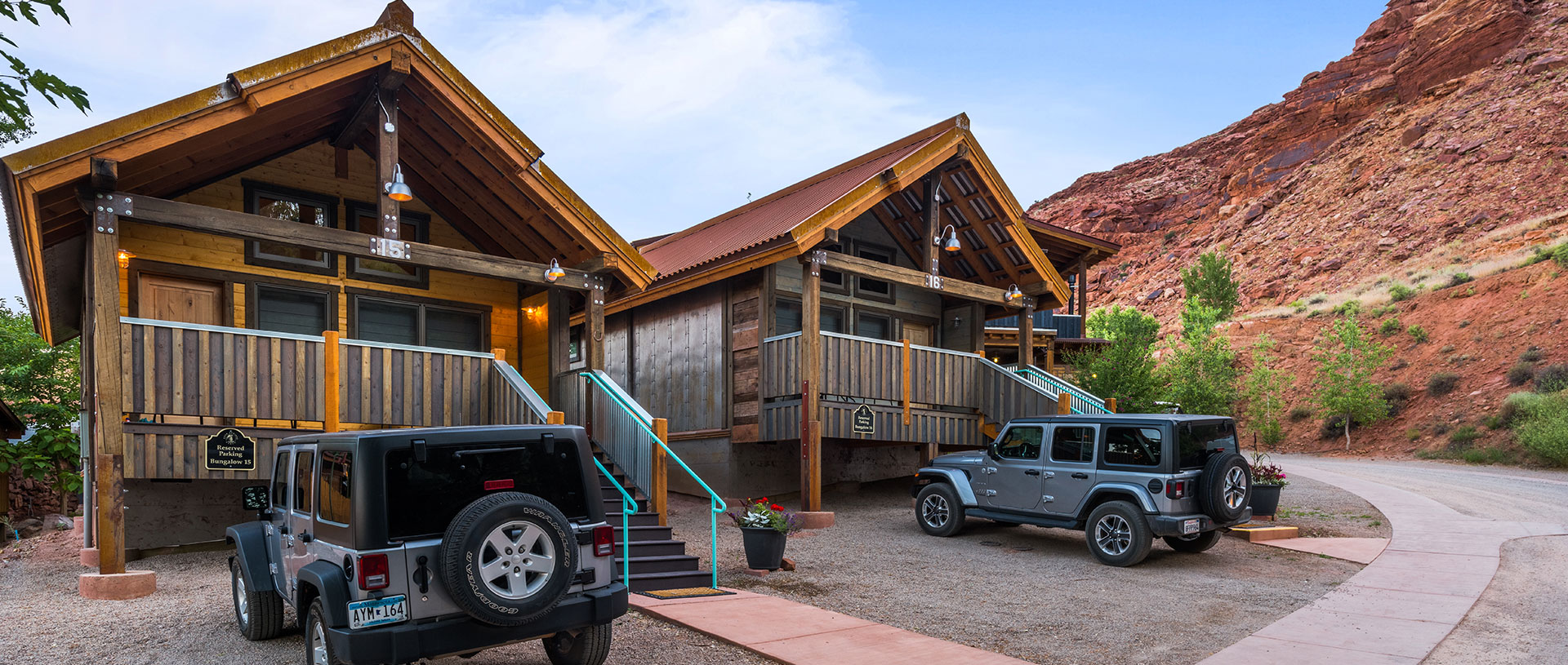 A large three dimensional model illustration of the front entrance of a guest bungalow unit at Moab Springs Ranch with a triangular wood slat roof.