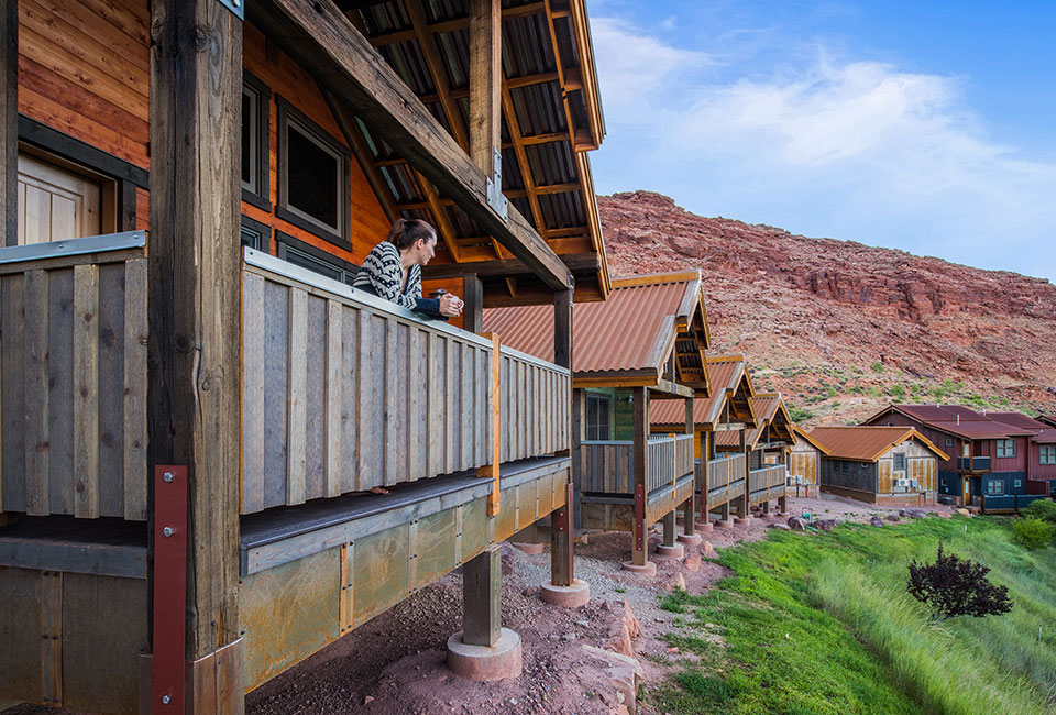 A brown and grey drawing of a typical bungalow unit, built entirely in wood, on the property of Moab Springs Ranch in Moab, Utah.